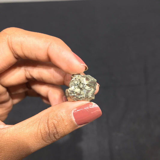 Natural Pocket Pyrite Premium Cluster in the hand
