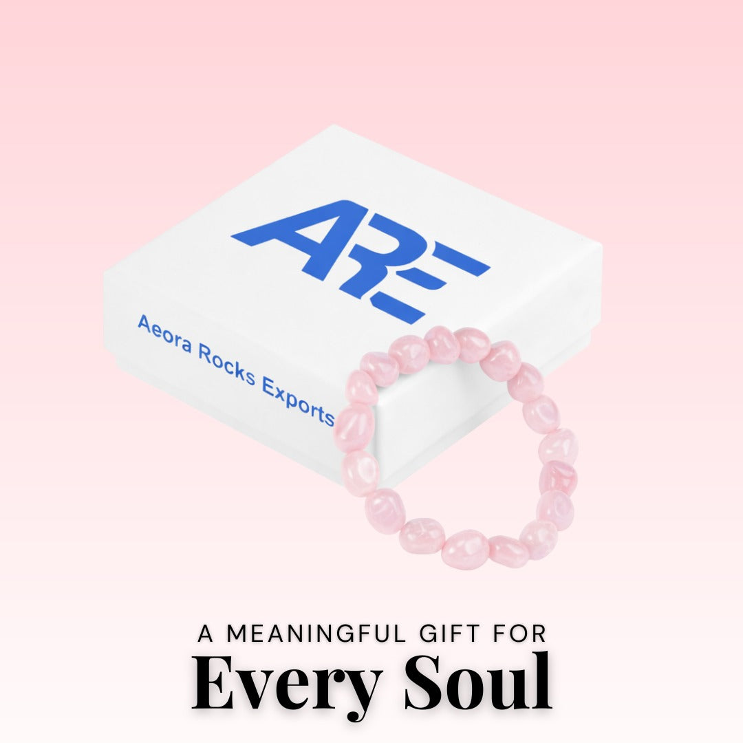 Pink beaded bracelet on a white card with 'Aera Rocks Exports' branding against a pink background.