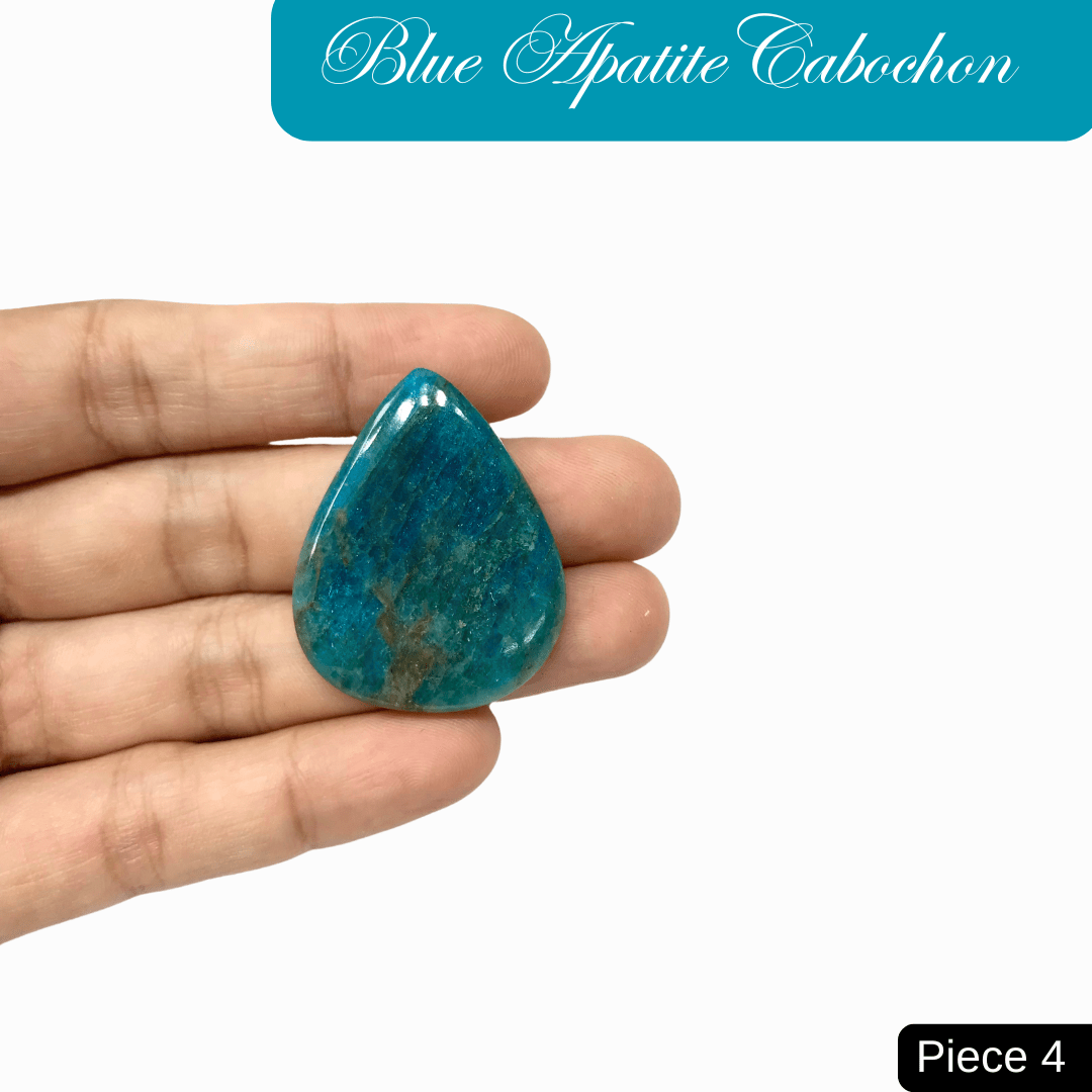 Person holding a blue apatite cabochon with vibrant ocean blue hues, known for clarity and motivational energy, labeled 'Piece 4'.