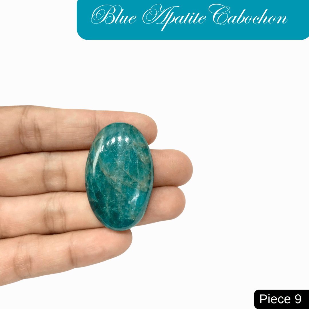 Blue apatite cabochon gemstone in hand showcasing vibrant blue and turquoise hues, known for clarity and motivational energy.