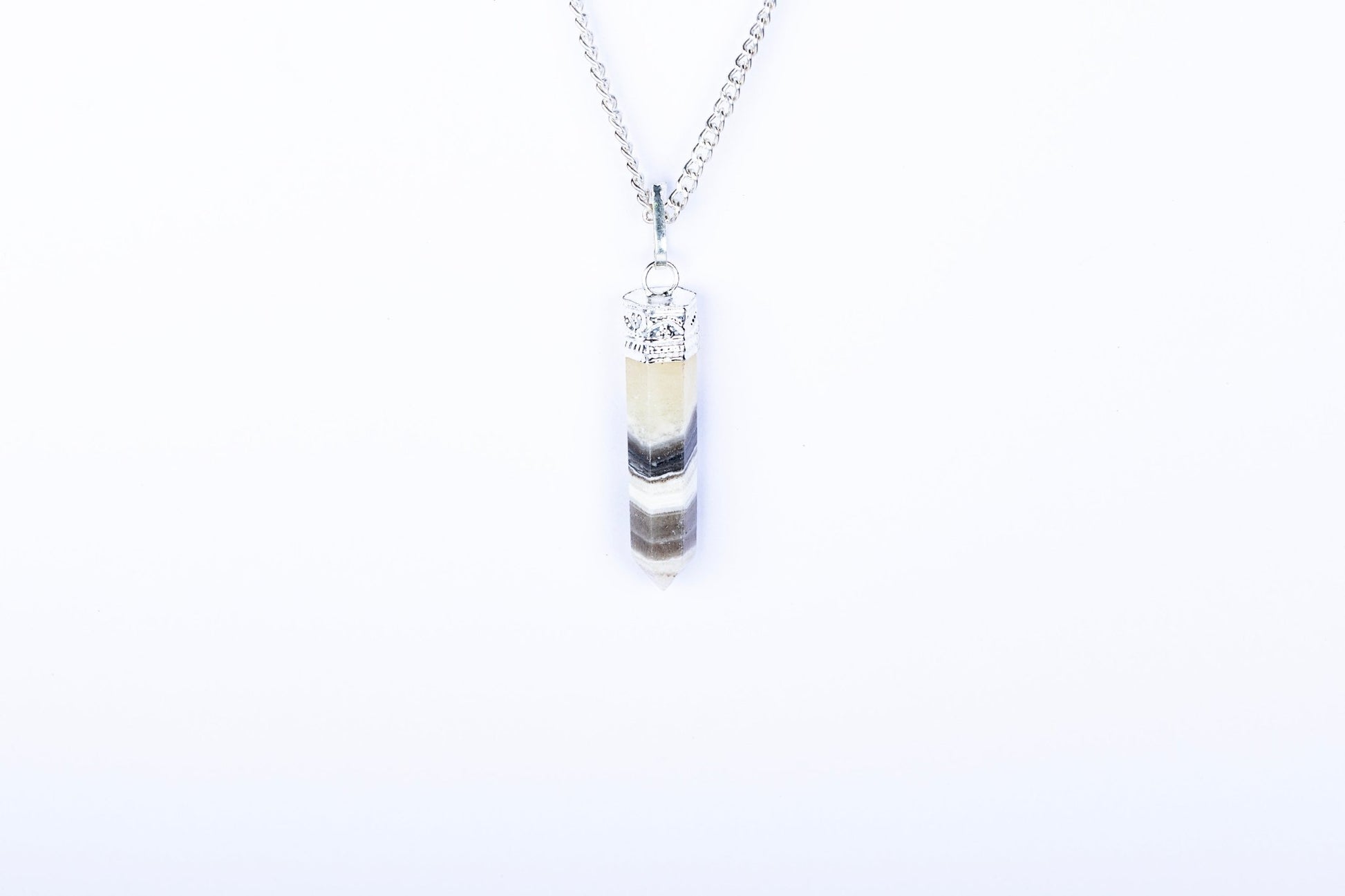 Calcite Single Point Pendant - AEORA ROCKS INDIA - Healing Crystals superstore