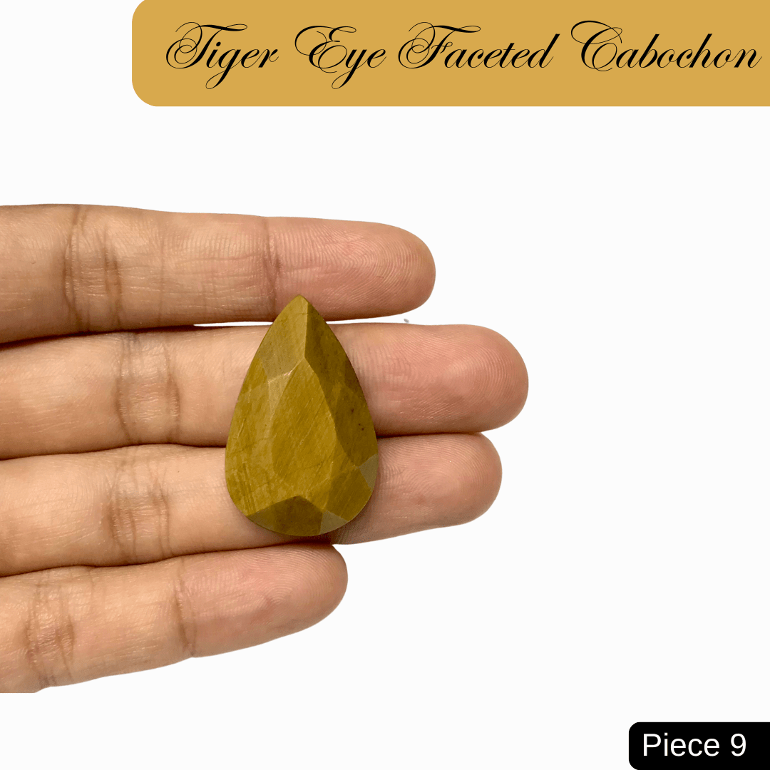 Faceted Tiger Eye cabochon with golden-brown bands, showcasing silky chatoyancy; a stone of courage, clarity, and grounding energy.