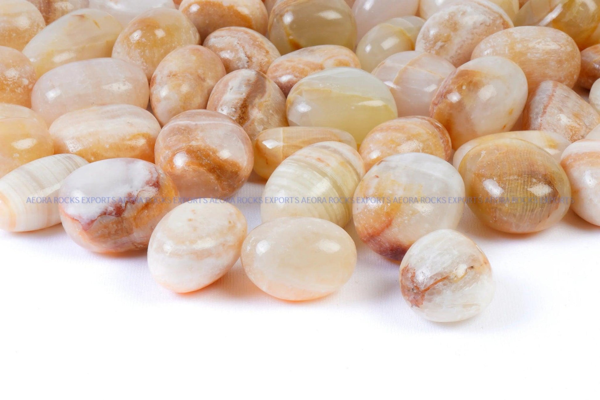 Yellow Banded Calcite Tumbled Stone in India - Aeora Rocks - AEORA ROCKS INDIA - Healing Crystals superstore