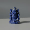 Sodalite Blue stone Ganesh statue on a white background