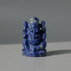 Sodalite Blue stone Ganesh statue on a white background