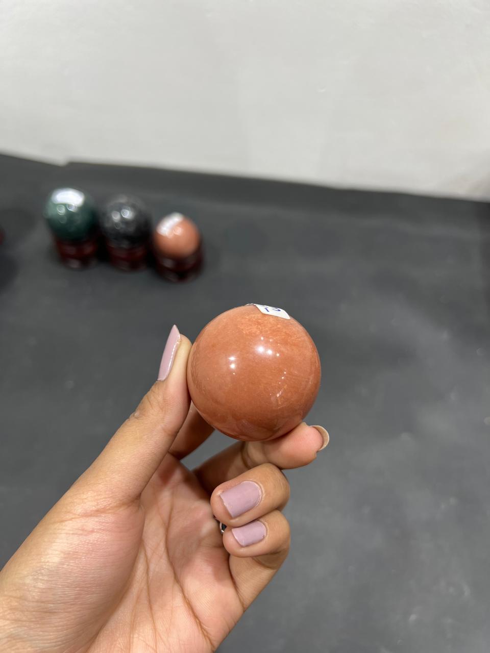 Red Aventurine Sphere 117g - AEORA ROCKS INDIA -Healing Crystals superstore