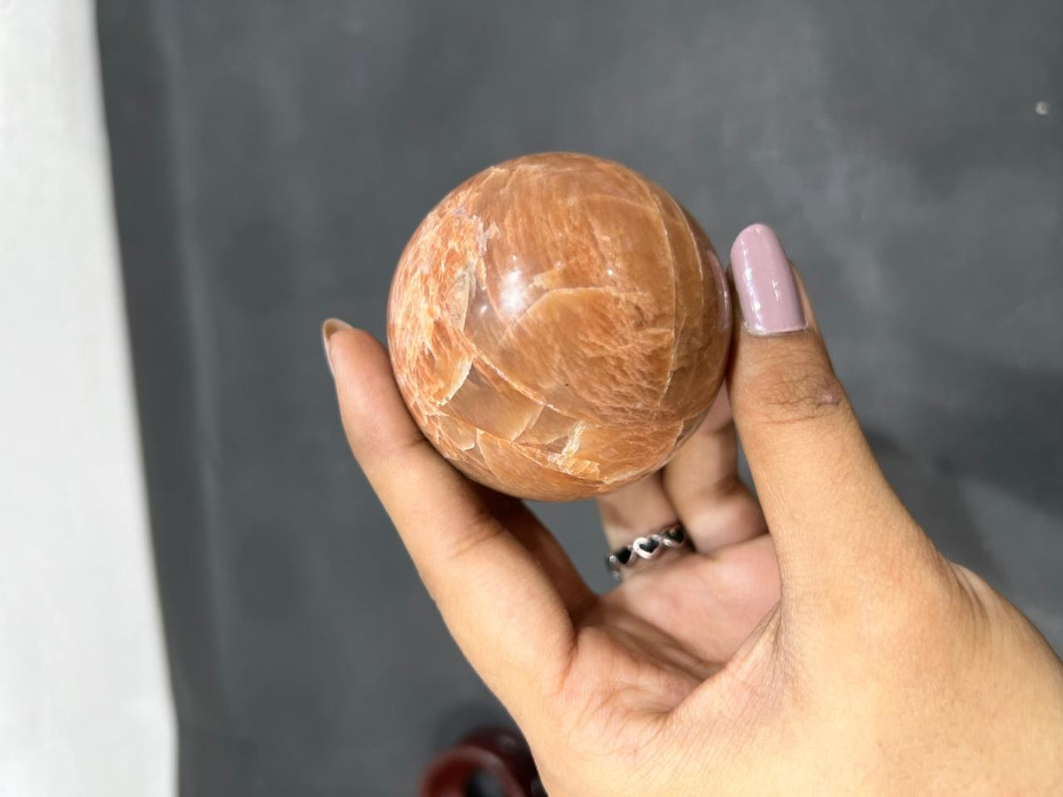 Orange Moonstone Sphere 280g - AEORA ROCKS INDIA -Healing Crystals superstore
