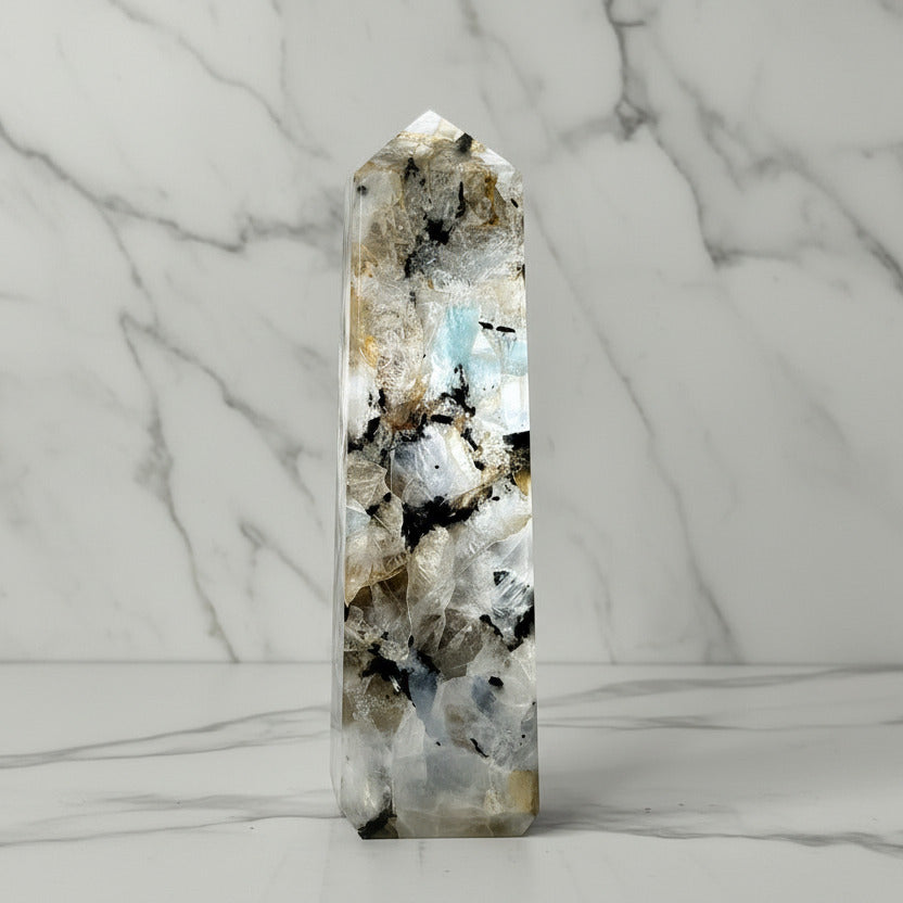 Crystal tower with natural patterns on a plain background