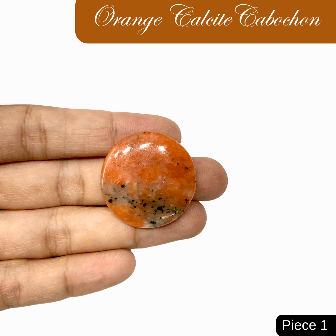 Hand holding a round Orange Calcite cabochon, showcasing its vibrant hue and energy, ideal for creativity and inspiration.