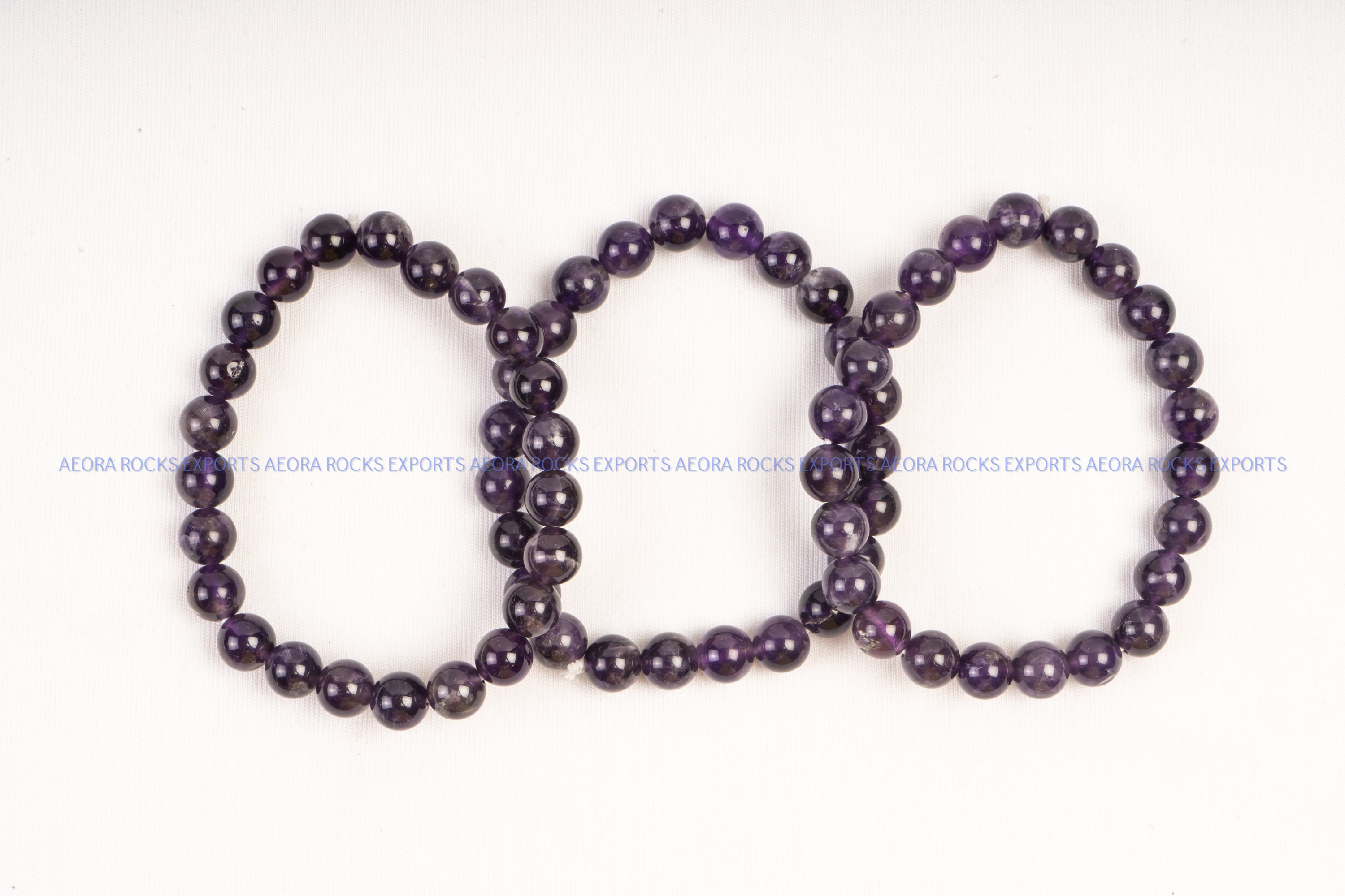 Onyx and Amethyst Beaded Stretch Bracelet from Thailand - Black Sky | NOVICA