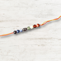 Seven Chakra With Buddha Rakhi in India - Aeora Rocks - AEORA ROCKS INDIA - Healing Crystals superstore