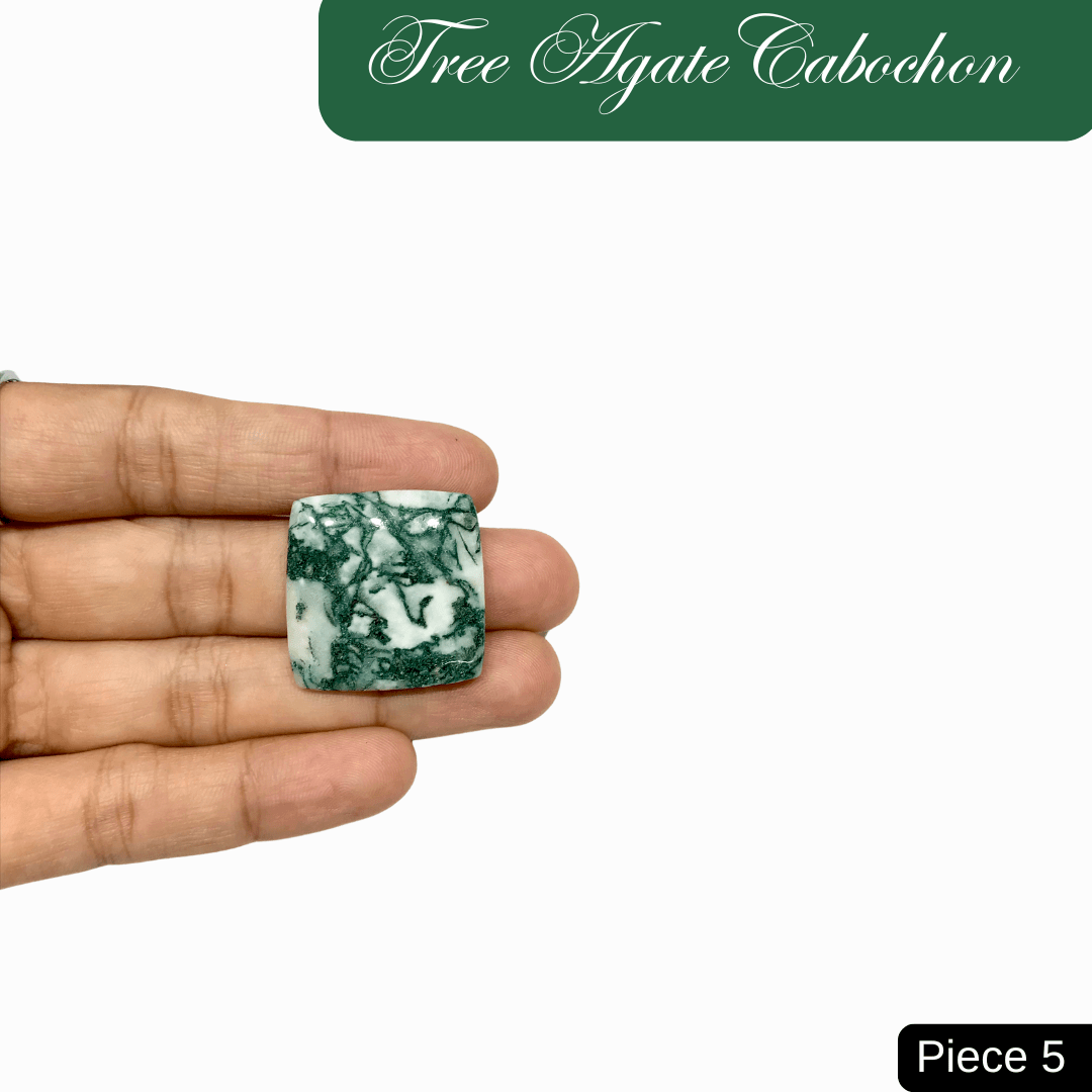 Tree Agate Cabochon with green and white marbled pattern promoting inner peace, held in hand, piece 5.
